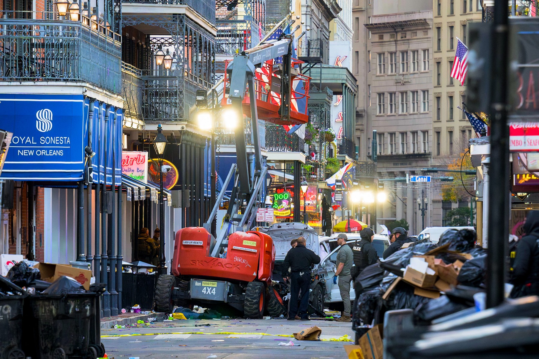 Police investigators surround a white truck that has been crashed into a work lift in the French Quarter of New Orleans, Louisiana, on January 1, 2025. At least 10 people were killed and 30 injured Wednesday when a vehicle plowed overnight into a New year's crowd in the heart of the thriving New Orleans tourist district, authorities in the southern US city said.,Image: 951223584, License: Rights-managed, Restrictions: , Model Release: no, Credit line: Matthew HINTON / AFP / Profimedia