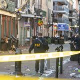 FBI investigators arrive at the scene where the white Ford F-150 pickup truck that crashed into a work lift after allegedly driving into a crowd of New Year's revelers in the French Quarter of New Orleans, Louisiana, on January 1, 2025. At least 10 people were killed and 30 injured Wednesday when a vehicle plowed overnight into a New year's crowd in the heart of the thriving New Orleans tourist district, authorities in the southern US city said.,Image: 951237976, License: Rights-managed, Restrictions: , Model Release: no, Credit line: Matthew HINTON / AFP / Profimedia