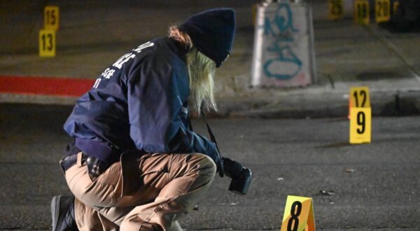 January 2, 2025, Jamaica, Queens, New York, United States: NYPD police officers place down evidence markers and collect shell casings after a mass shooting at a nightclub in Jamaica, Queens, New York, United States on Wednesday, January 1, 2025. Wednesday, January 1st at least 10 people were injured in a mass shooting at a nightclub. The shooting occurred near the Amazura nightclub in Jamaica neighborhood of Queens, New York. Approximately 90 people were inside the nightclub and 50 people were outside. Six women and four men were all shot by multiple shooters who fired 30 shots. All of the victims are expected to survive.,Image: 951338021, License: Rights-managed, Restrictions: , Model Release: no, Credit line: Kyle Mazza / Zuma Press / Profimedia