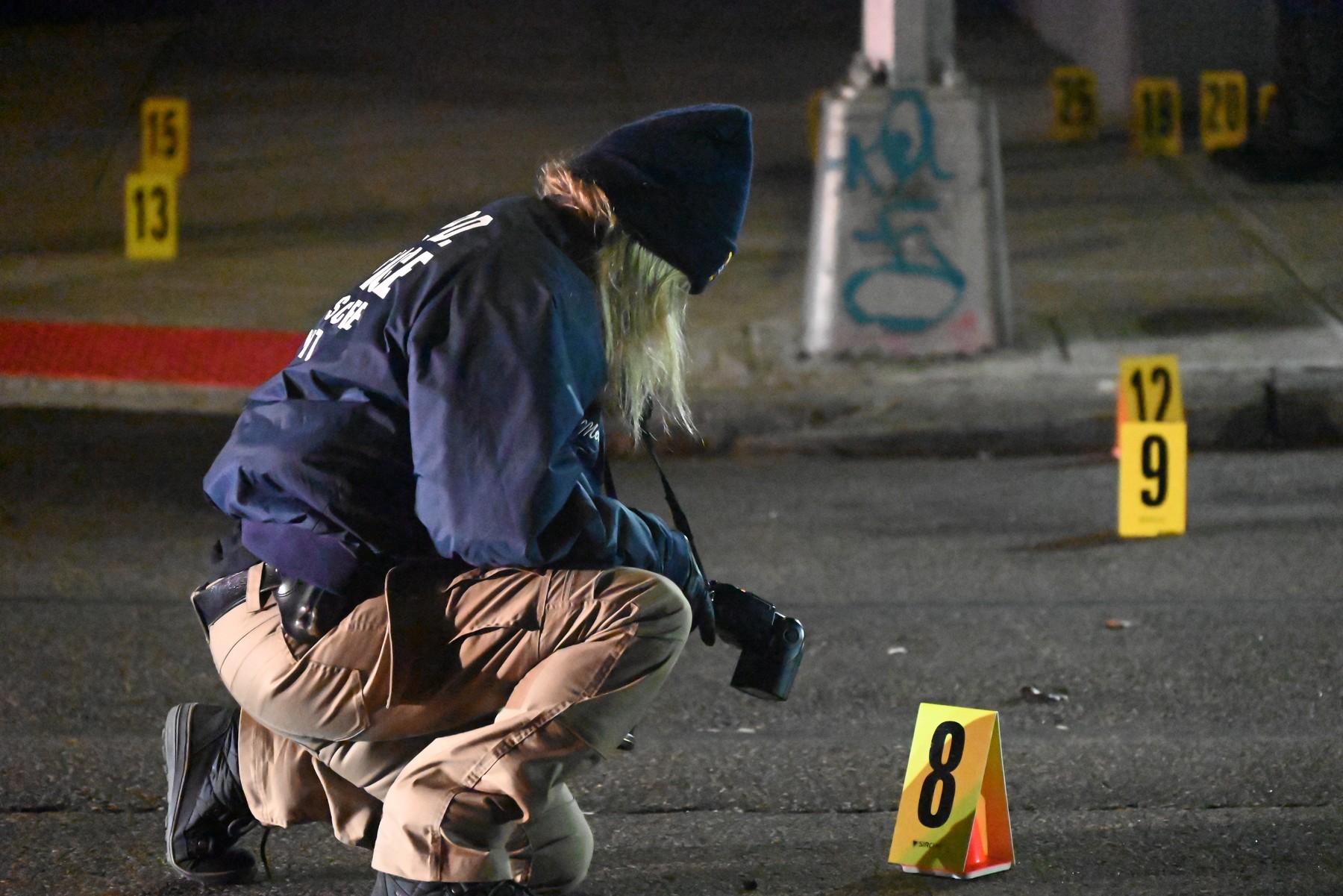 January 2, 2025, Jamaica, Queens, New York, United States: NYPD police officers place down evidence markers and collect shell casings after a mass shooting at a nightclub in Jamaica, Queens, New York, United States on Wednesday, January 1, 2025. Wednesday, January 1st at least 10 people were injured in a mass shooting at a nightclub. The shooting occurred near the Amazura nightclub in Jamaica neighborhood of Queens, New York. Approximately 90 people were inside the nightclub and 50 people were outside. Six women and four men were all shot by multiple shooters who fired 30 shots. All of the victims are expected to survive.,Image: 951338021, License: Rights-managed, Restrictions: , Model Release: no, Credit line: Kyle Mazza / Zuma Press / Profimedia