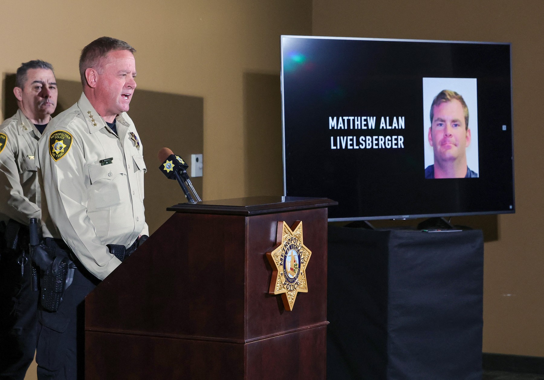 LAS VEGAS, NEVADA - JANUARY 02: An image of Matthew Alan Livelsberger driver’s license photo is displayed on a monitor as Las Vegas Metropolitan Police Department Sheriff Kevin McMahill speaks about the Tesla Cybertruck that exploded on New Year's Day in front of the entrance to the Trump International Hotel & Tower Las Vegas during a news conference at LVMPD headquarters on January 02, 2025 in Las Vegas, Nevada. McMahill said that authorities believe the person of interest in the incident is Livelsberger, a 37-year-old active member of the U.S. military, but are waiting for the coroner to make the final determination. McMahill also said the driver suffered a gunshot wound to the head that is believed to have been self-inflicted.   Ethan Miller,Image: 951415742, License: Rights-managed, Restrictions: , Model Release: no, Credit line: Ethan Miller / Getty images / Profimedia