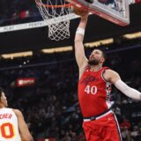 INGLEWOOD, CALIFORNIA - JANUARY 04: Ivica Zubac #40 of the LA Clippers dunks in front of Zaccharie Risacher #10 of the Atlanta Hawks during a 131-105 Clippers win at Intuit Dome on January 04, 2025 in Inglewood, California.   Harry How,Image: 951858347, License: Rights-managed, Restrictions: USER IS NOT PERMITTED TO DOWNLOAD OR USE IMAGE WITHOUT PRIOR APPROVAL.NOTE TO USER: User expressly acknowledges and agrees that, by downloading and or using this photograph, User is consenting to the terms and conditions of the Getty Images License Agreeme, Model Release: no, Credit line: Harry How / Getty images / Profimedia