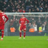 Liverpool's Andrew Robertson (centre) reacts after conceding a second goal to Manchester United's Amad Diallo (not pictured) during the Premier League match at Anfield, Liverpool. Picture date: Sunday January 5, 2025.,Image: 951931481, License: Rights-managed, Restrictions: EDITORIAL USE ONLY No use with unauthorised audio, video, data, fixture lists, club/league logos or "live" services. Online in-match use limited to 120 images, no video emulation. No use in betting, games or single club/league/player publications., Model Release: no, Credit line: Peter Byrne / PA Images / Profimedia