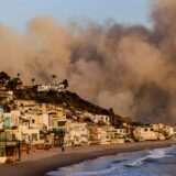 January 7, 2025, Malibu, California, U.S.A: Smoke billowing from the Palisades Fire behind the exclusive Malibu beach community that houses many movie stars and other celebrities. Fire broke out on January 7, 2025, as seen from the PCH (Pacific Coast Highway) in the affluent town of Pacific Palisades, on the edge of Malibu, CA, due to unusually strong Santa Ana winds that exceeded 100 MPH,Image: 952381786, License: Rights-managed, Restrictions: , Model Release: no, Credit line: Amy Katz / Zuma Press / Profimedia