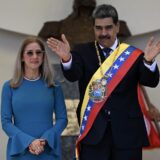 Venezuela's President Nicolas Maduro gestures next to his wife Cilia Flores as they leave the Capitolio -home of the National Assembly- after taking the oath during the presidential inauguration in Caracas on January 10, 2025. Maduro, in power since 2013, took the oath of office for a third term despite a global outcry that brought thousands out in protest on the ceremony's eve.,Image: 952782104, License: Rights-managed, Restrictions: ALTERNATIVE CROP, Model Release: no, Credit line: Juan BARRETO / AFP / Profimedia