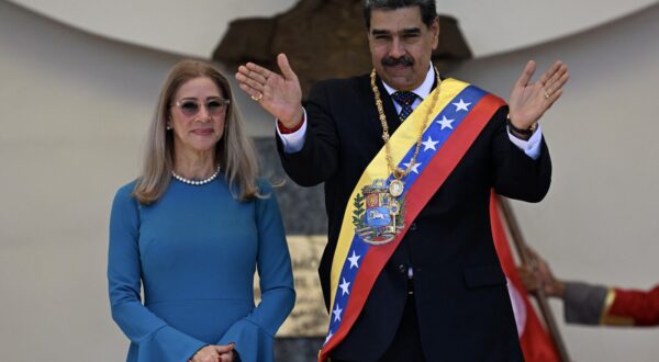 Venezuela's President Nicolas Maduro gestures next to his wife Cilia Flores as they leave the Capitolio -home of the National Assembly- after taking the oath during the presidential inauguration in Caracas on January 10, 2025. Maduro, in power since 2013, took the oath of office for a third term despite a global outcry that brought thousands out in protest on the ceremony's eve.,Image: 952782104, License: Rights-managed, Restrictions: ALTERNATIVE CROP, Model Release: no, Credit line: Juan BARRETO / AFP / Profimedia