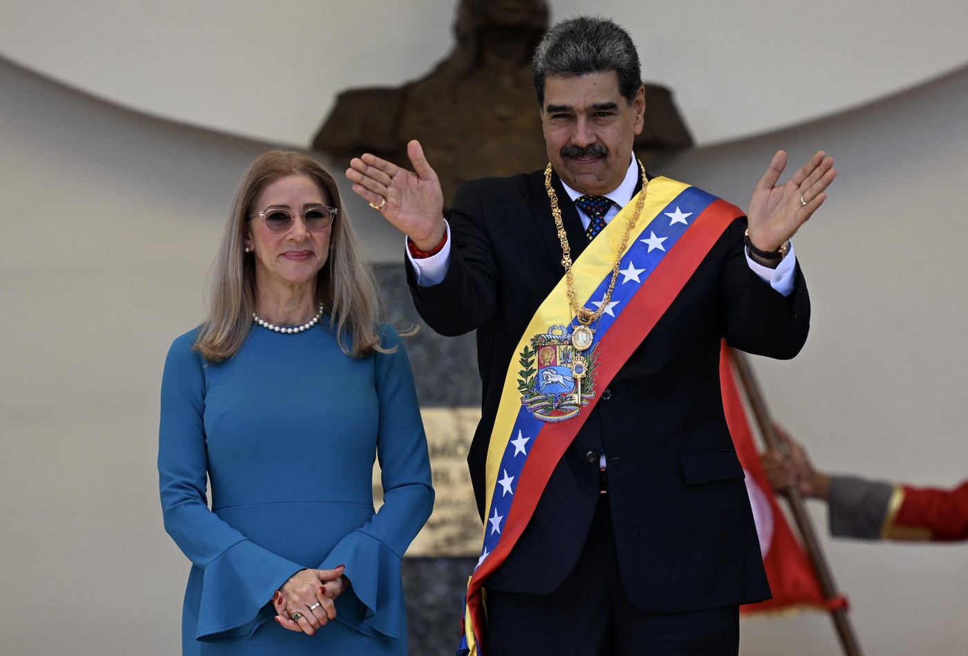 Venezuela's President Nicolas Maduro gestures next to his wife Cilia Flores as they leave the Capitolio -home of the National Assembly- after taking the oath during the presidential inauguration in Caracas on January 10, 2025. Maduro, in power since 2013, took the oath of office for a third term despite a global outcry that brought thousands out in protest on the ceremony's eve.,Image: 952782104, License: Rights-managed, Restrictions: ALTERNATIVE CROP, Model Release: no, Credit line: Juan BARRETO / AFP / Profimedia