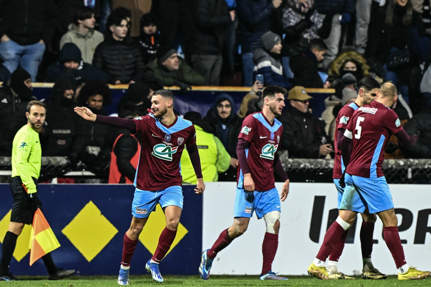 Bourgoin Jallieu’s Moroccan midfielder #09 Mehdi Moujetsky (2nd L) celebrates with teammates after scoring his team's second goal during the French Cup round of 32 football match between FC Bourgoin-Jallieu and Olympique Lyonnais (Lyon) at the Pierre-Rajon stadium in Bourgoin-Jallieu, central eastern France, on January 15, 2025.,Image: 953966859, License: Rights-managed, Restrictions: , Model Release: no, Credit line: JEFF PACHOUD / AFP / Profimedia