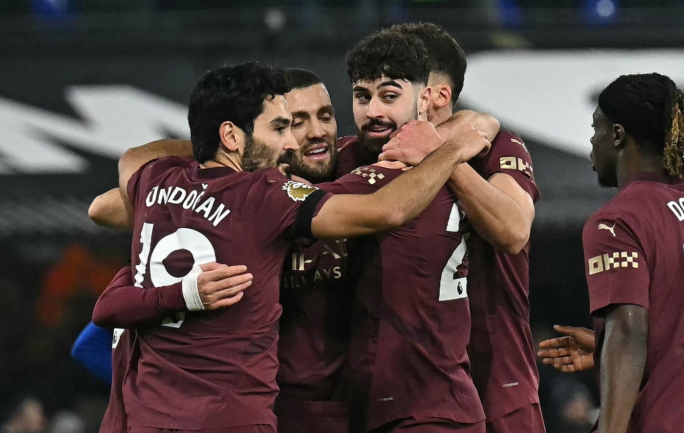 Manchester City's Croatian midfielder #08 Mateo Kovacic (C) celebrates with teammates after scoring their second goal during the English Premier League football match between Ipswich Town and Manchester City at Portman Road in Ipswich, eastern England on January 19, 2025.,Image: 955378556, License: Rights-managed, Restrictions: RESTRICTED TO EDITORIAL USE. No use with unauthorized audio, video, data, fixture lists, club/league logos or 'live' services. Online in-match use limited to 120 images. An additional 40 images may be used in extra time. No video emulation. Social media in-match use limited to 120 images. An additional 40 images may be used in extra time. No use in betting publications, games or single club/league/player publications., Model Release: no, Credit line: Ben STANSALL / AFP / Profimedia