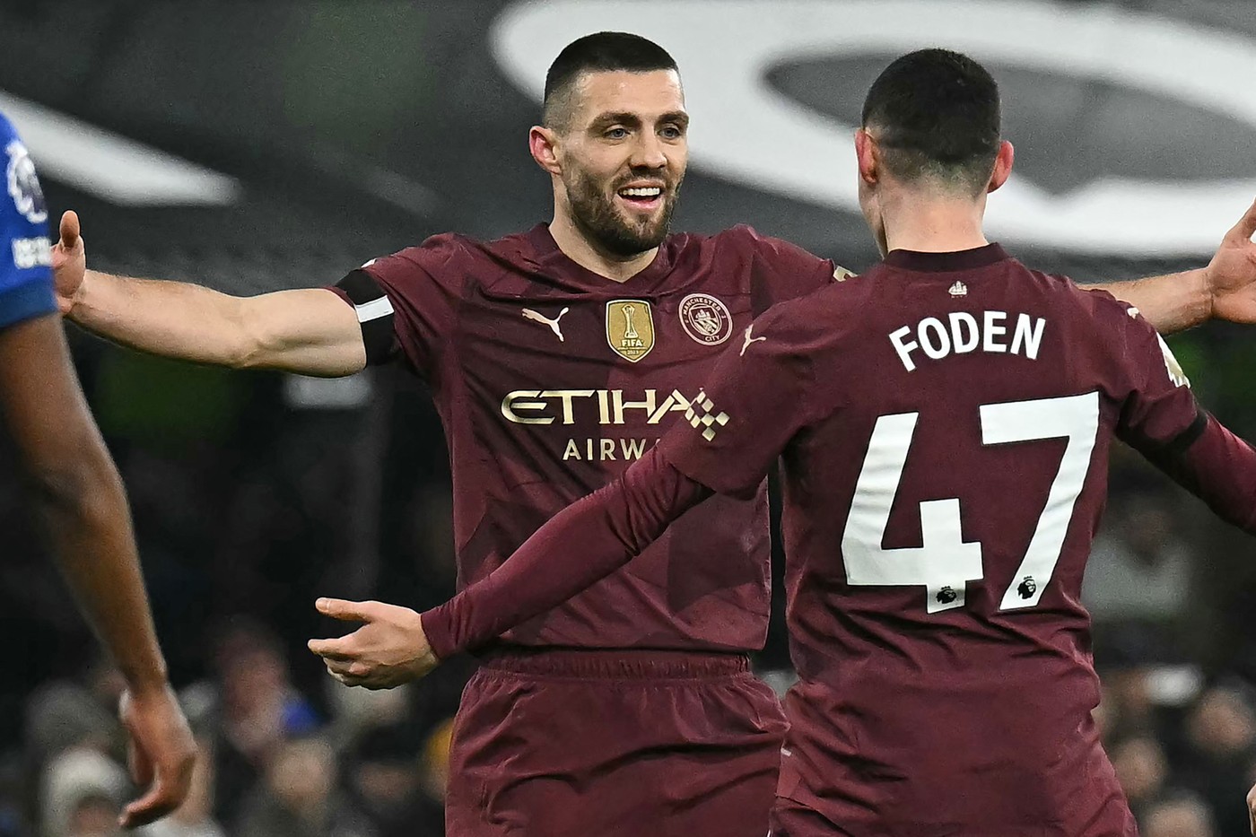 Manchester City's Croatian midfielder #08 Mateo Kovacic (L) celebrates with Manchester City's English midfielder #47 Phil Foden after scoring their second goal during the English Premier League football match between Ipswich Town and Manchester City at Portman Road in Ipswich, eastern England on January 19, 2025.,Image: 955379170, License: Rights-managed, Restrictions: RESTRICTED TO EDITORIAL USE. No use with unauthorized audio, video, data, fixture lists, club/league logos or 'live' services. Online in-match use limited to 120 images. An additional 40 images may be used in extra time. No video emulation. Social media in-match use limited to 120 images. An additional 40 images may be used in extra time. No use in betting publications, games or single club/league/player publications., Model Release: no, Credit line: Ben STANSALL / AFP / Profimedia