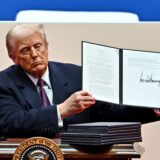 US President Donald Trump signs executive orders during the inaugural parade inside Capital One Arena, in Washington, DC, on January 20, 2025.,Image: 955836778, License: Rights-managed, Restrictions: , Model Release: no, Credit line: ANGELA WEISS / AFP / Profimedia