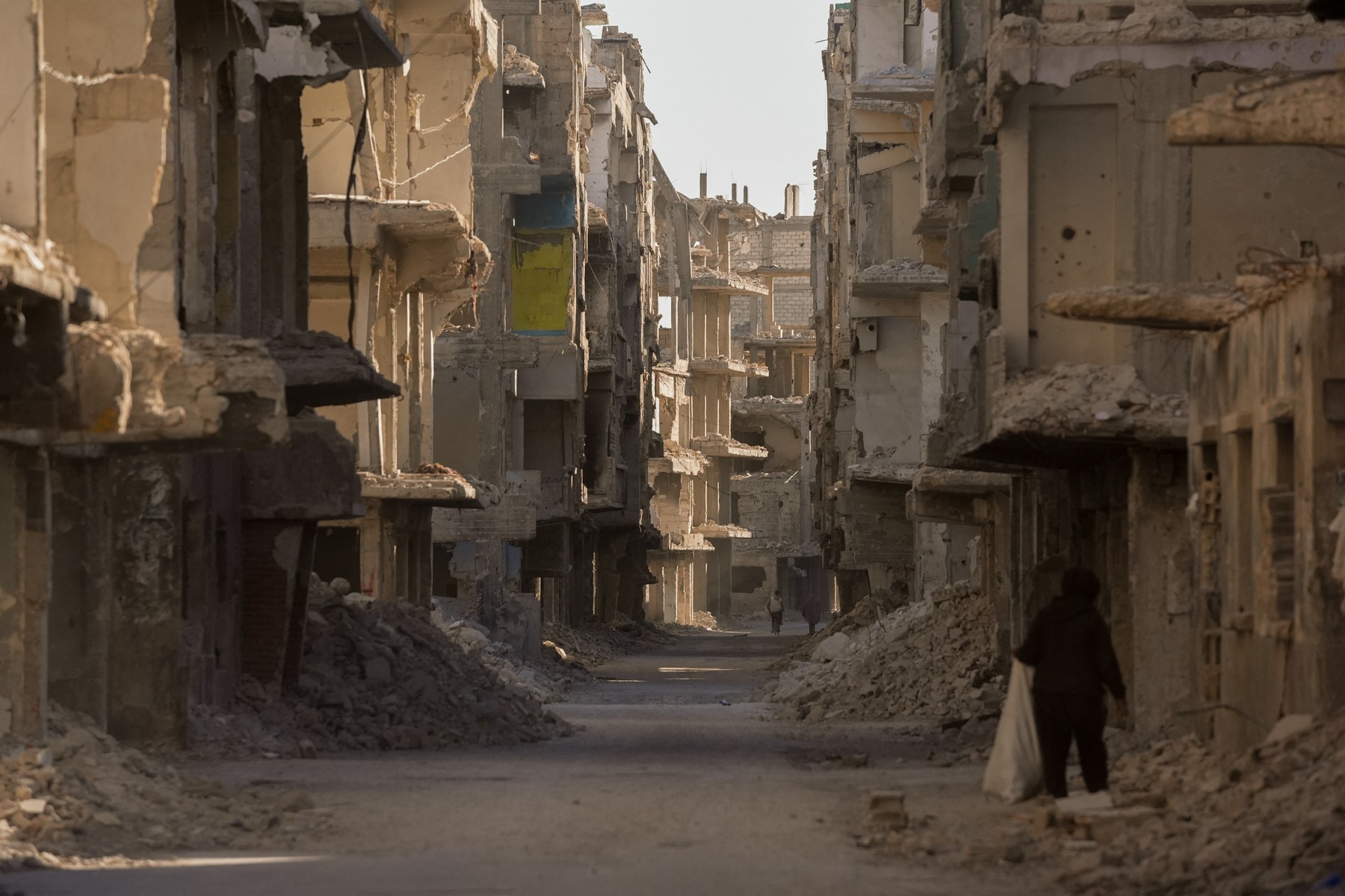 DAMASCUS, SYRIA - JANUARY 18: A view of the streets and buildings, showing the traces of the 13-year civil war, after the fall of the regime of Bashar al-Assad, in Hajar al-Aswad area of Damascus, Syria on January 18, 2025. Ercin Erturk / Anadolu,Image: 956302505, License: Rights-managed, Restrictions: , Model Release: no, Credit line: Ercin Erturk / AFP / Profimedia