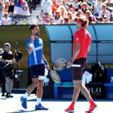 Serbia's Novak Djokovic (L) shakes hands with Germany's Alexander Zverev after retiring from the men's singles semifinal on day thirteen of the Australian Open tennis tournament in Melbourne on January 24, 2025.,Image: 957112177, License: Rights-managed, Restrictions: -- IMAGE RESTRICTED TO EDITORIAL USE - STRICTLY NO COMMERCIAL USE --, Model Release: no, Credit line: Martin KEEP / AFP / Profimedia