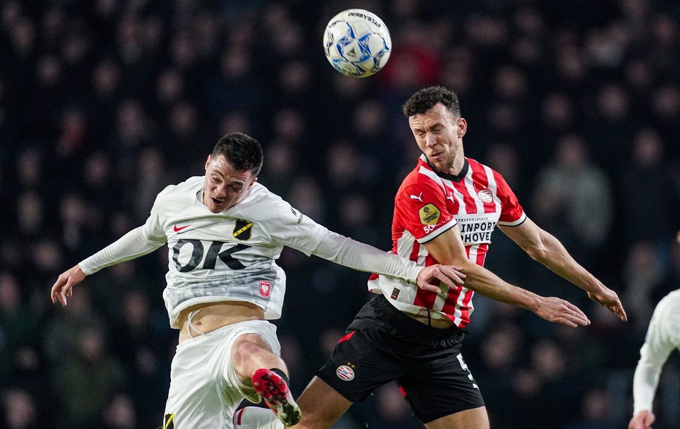 2025-01-25 PSV v NAC Breda - Dutch Eredivisie EINDHOVEN, NETHERLANDS - JANUARY 25: Dominik Janosek of NAC Breda, Ivan Perisic of PSV head the ball during the Dutch Eredivisie match between PSV and NAC Breda at Philips Stadion on January 25, 2025 in Eindhoven, Netherlands. Eindhoven Philips Stadion Netherlands Content not available for redistribution in The Netherlands directly or indirectly through any third parties. Copyright: xJorisxVerwijstx,Image: 957645586, License: Rights-managed, Restrictions: , Model Release: no, Credit line: Joris Verwijst / imago sportfotodienst / Profimedia